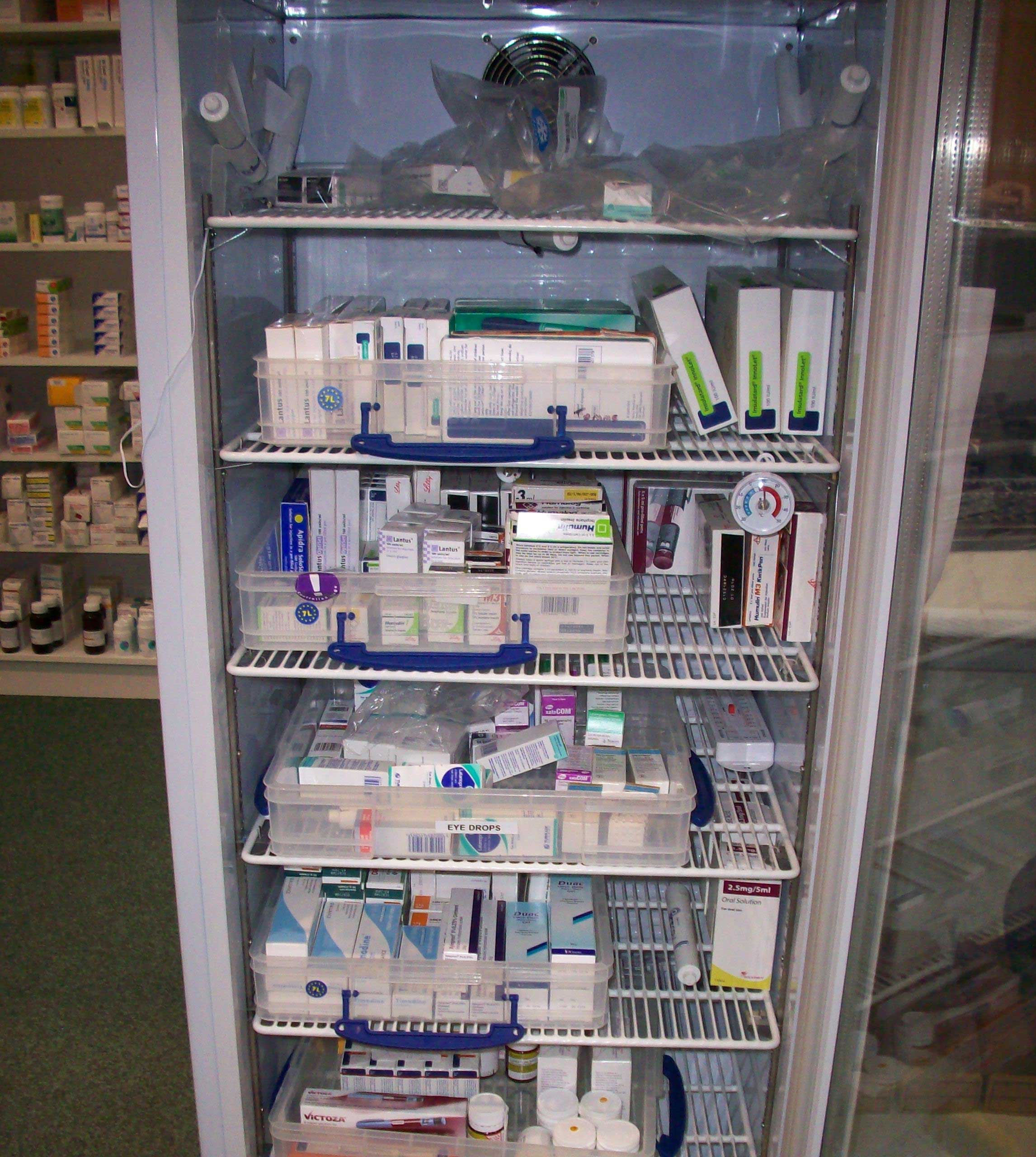large fridge stocked with pharmaceutical items